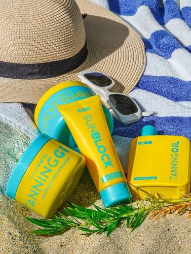 Eight Fifty tanning products with beach accessories